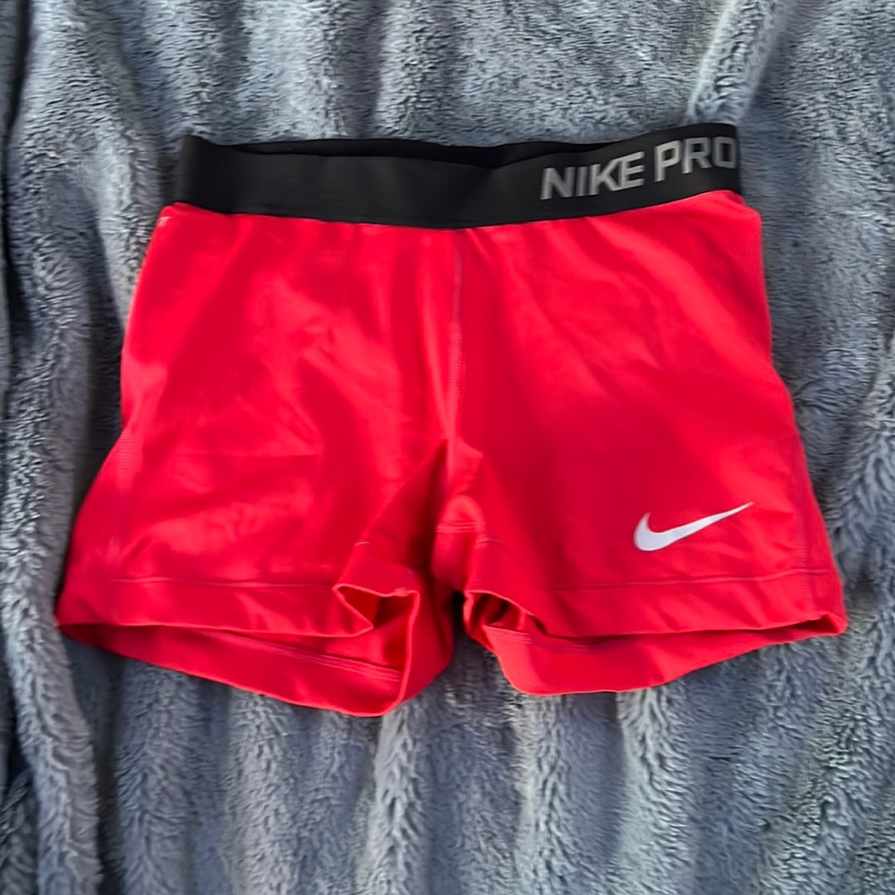 red nike pros